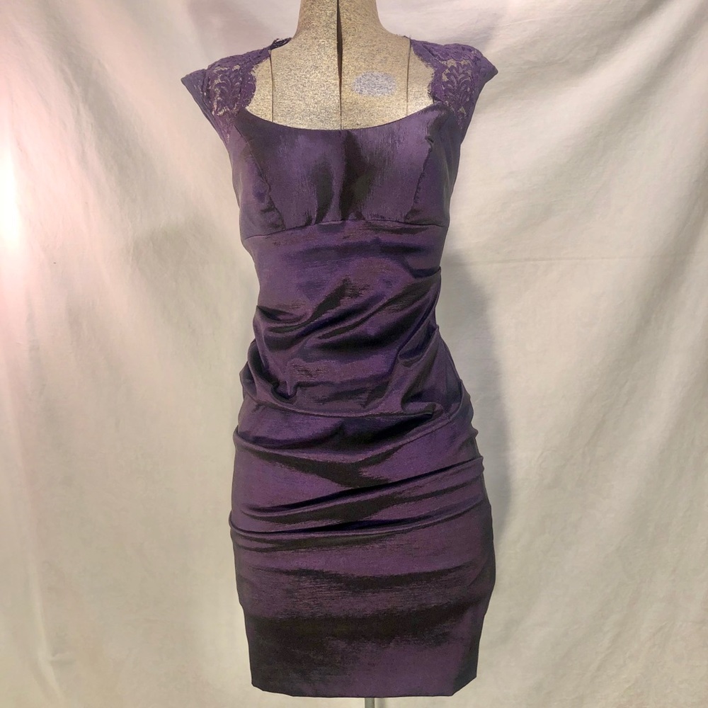 Purple occasion dress.